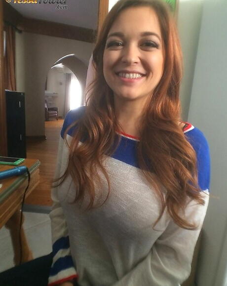 Seductive american pornstar Tessa Fowler taking off her clothes and exposing big boobs 