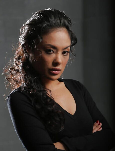 Luscious malaysian milf Kaylani Lei uncovers tiny tits while taking off her clothes 