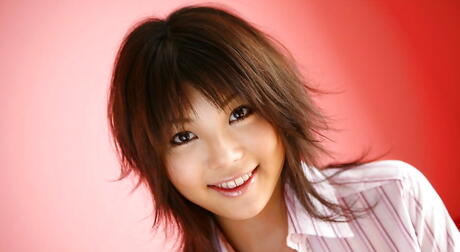 Facinating japanese babe Azumi Harusaki showing big boobies and spreading her legs 