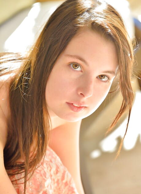 Foxy young Pamela Aeris bares her ass in sexy skirt and plays with toy 