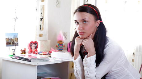 Slender dark-haired teen Zoya in uniform revealing her ass and spreading her legs 