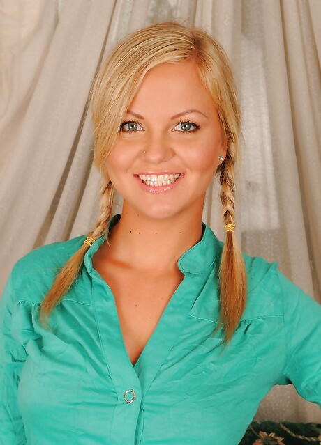 Slim hungarian blond teen Sunny Diamond exhibiting big titties and sexy butt 