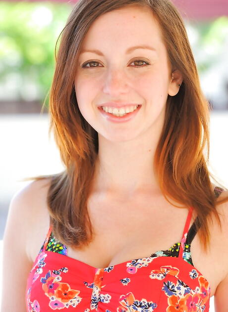 Sylphlike young Ally Evans in hot lingerie baring big tits and spreading her legs outside