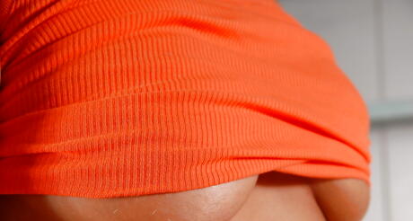 Sexy blond hottie Tea in fancy shorts exhibiting big boobs and masturbating in kitchen