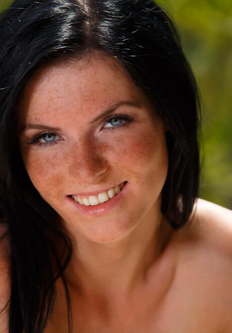 Sexy dark hair young Eileen in hot lingerie exposes her ass and hairy twat outside