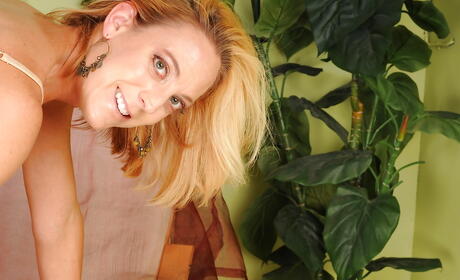 Excellent american blonde mature Charli Shay bares tiny tits and hairy twat 