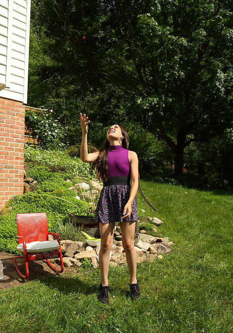 Svelte brunette babe Freya Von Doom exhibits tiny tits and toys her twat outdoor