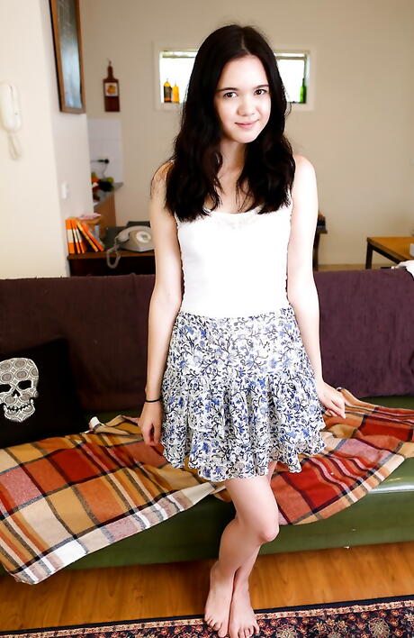 Shapely australian dark-haired teen Lily Rei in nice skirt bares small tits and hairy beaver 