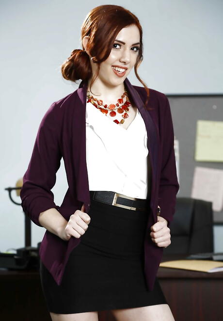 Shapely american youthful Ember Stone in sexy underwear taking off her clothes in office