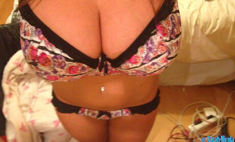 Very attractive brittish porn star Sarah Nicola Randall in hot underwear baring big tits and hot butt 