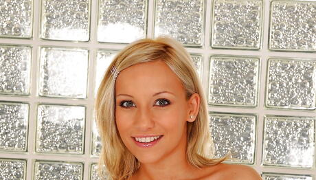 Shapely blonde youthful Candy exposing tiny tits and masturbating with dildo 