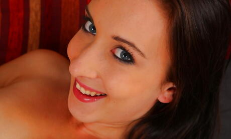 Slender brunette youthful Jessie Sinclair unveils small tits and puts a toy in her twat 