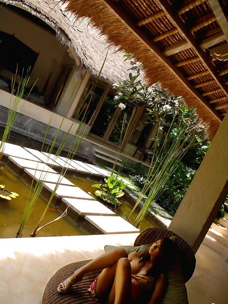 Slender japanese babe Honoka in skirt denudes small tits and spreads her legs 