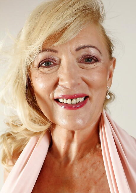 Sexy blonde older Janet Lesley bares her ass in sexy undies and jerks off 