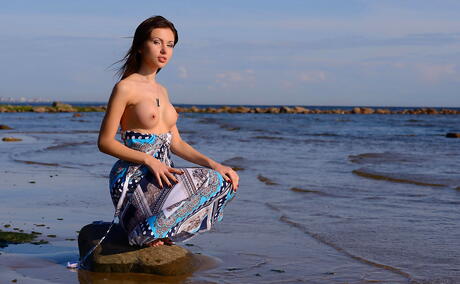 Foxy canadian youthful Sasha Rose in skirt baring big hooters and sexy butt at beach