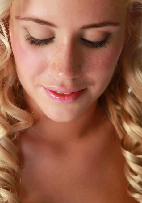 Glamorous blond hottie Paige shows big titties and hairy pussy 