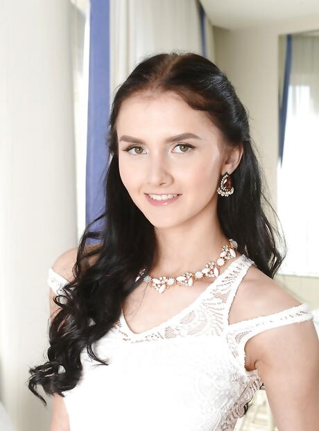 Luscious russian brunette teen Crystal Greenvelle in skirt reveals her butt 