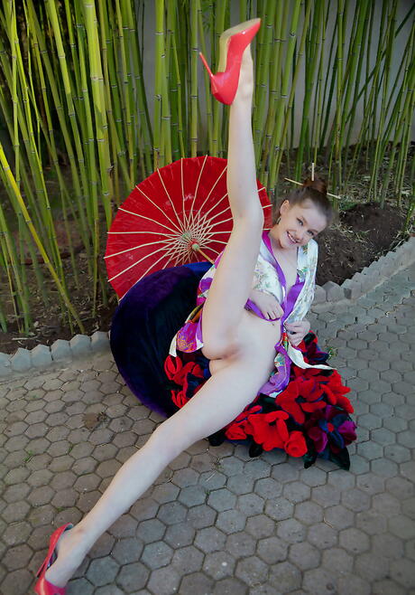 Foxy ukrainian youthful Emily Bloom bares big hooters and spreads her legs outside