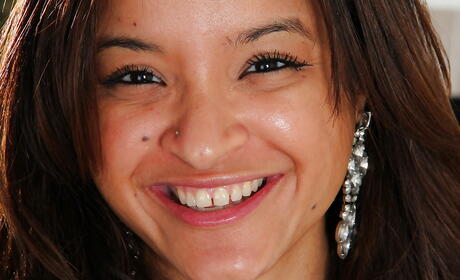 Lovely latina milf Viviann Wood bares big knockers and shaved pussy 