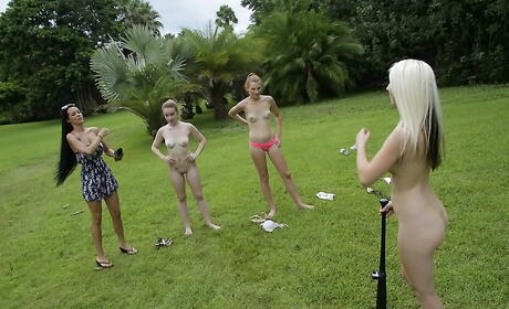 Curious women Esmi Lee and Nikki Bell in undies enjoy a lesbian foreplay outdoor