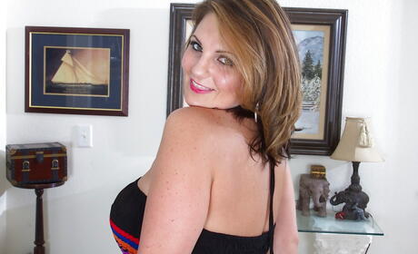 Superb american older Cherrie Dixon in skirt showing big boobies and shaved pussy 