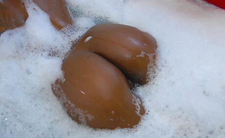 Excellent american babe Kim Kandy in sexy shorts reveals big hooters and ass in bath