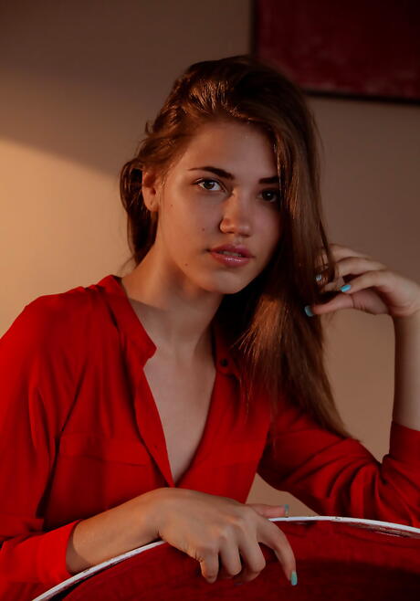 Slender red-haired young Jasmina in jeans bares small tits and spreads her legs 