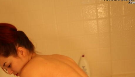 Hot american bombshell Tessa Fowler showing big boobies and butt in shower