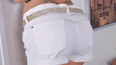 Curious polish babe Natasha Starr in fancy shorts revealing her ass and spreading her legs 