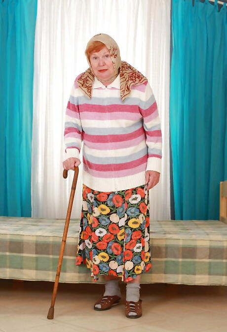 Charming granny Alice B in nice skirt revealing big tits and spreading her legs 