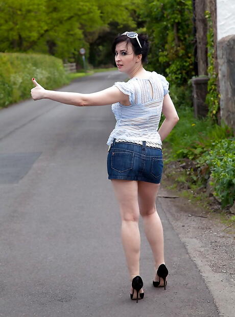 Delightful milf Jena in nice skirt reveals big boobies and spreads her legs outside