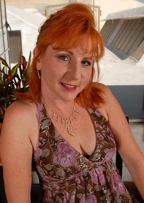 Excellent american redheaded mature Sasha Brand shows her butt in hot undies and spreading her legs 