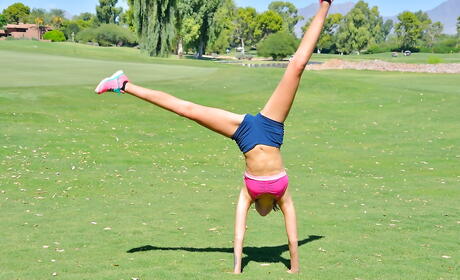 Svelte brunette teen Roxy Raine in fancy shorts uncovers small tits and sexy butt outdoor