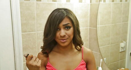 Inviting american hottie Nicole Bexley in sexy jeans exhibiting big boobies and spreading her legs in bath