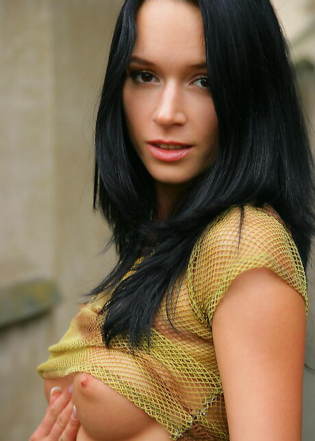 Facinating brunette hottie Gwen A in skirt exhibiting big boobies and vagina outdoor