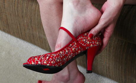 Slender older Joanie Bishop in sexy underwear in nasty foot fetish action 