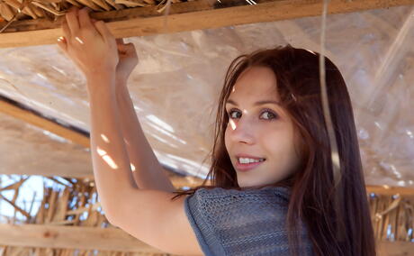 Foxy dark hair teen Gemma A exposes small tits and spreads her legs outdoor