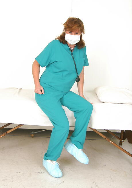 Seductive mature Surely shows big hooters and ass 