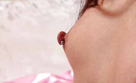 Sultry american brunette milf Annabelle Genovisi shows her ass in sexy undies and spreads her legs 