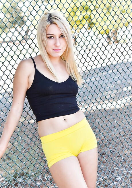 Rangy american blond teen Alexa Raye exhibiting small tits and sexy butt outdoor