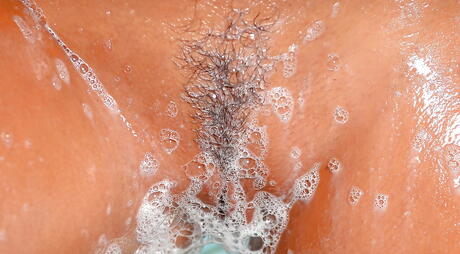 Excellent american brunette milf Eve Angel in sexy lingery baring big knockers and spreading her legs in the bathroom