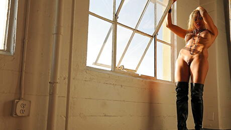 Tempting blond milf Sandy in fancy skirt exhibits big boobies and sissy 