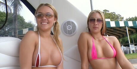 Stunning girls Allexis and Roxy in fancy bikini caressing each other outside