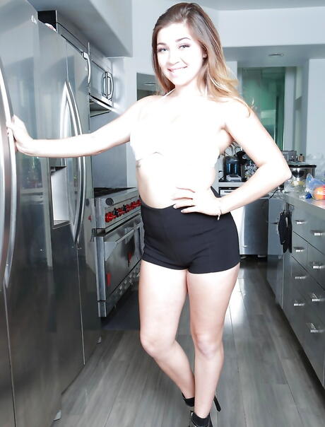 Tempting bombshell Audrey Belle showing big knockers and hot butt in shower