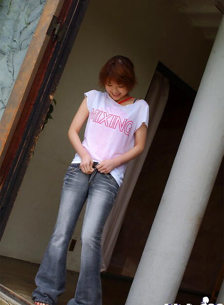 Attractive japanese amateur Madoka in sexy jeans showing her butt 