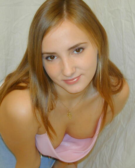 Stunning youthful Olga in skirt showing her ass and spreading her legs 