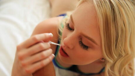 Slender american blond young Lily Rader deep throating big cock and takes a cum shot on her face 