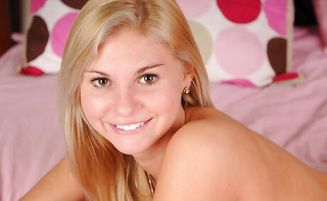 Sylphlike blond young Blair Winters exhibits big titties and masturbates 