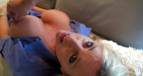 Stunning american blonde wife Sandra Otterson jerking off big cock and takes a facial 