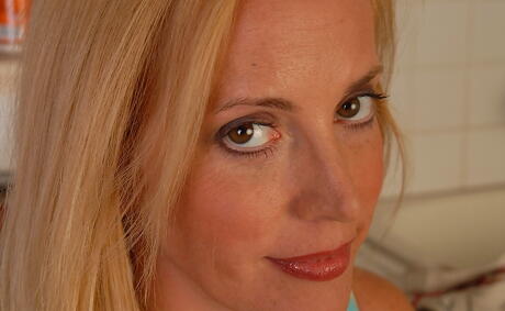 Very attractive aged Katrina revealing big knockers and bald pussy 